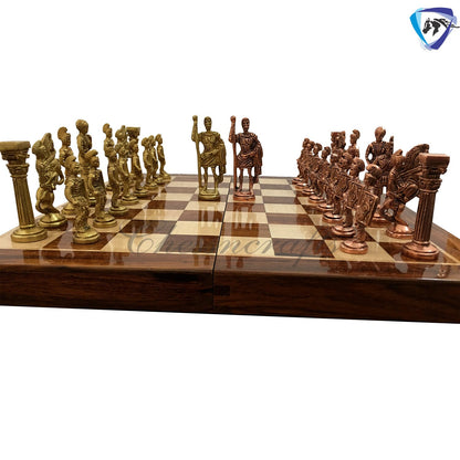 Folding Brass Roman chess figures & rosewood chess board set with storage of chess men.